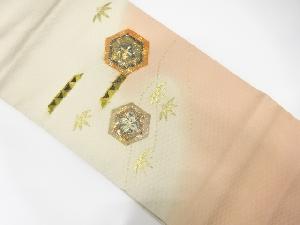 金彩螺鈿亀甲に笹・花模様名古屋帯